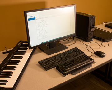 UNT Music Library Accessibility Station with scanner, MIDI Keyboard, and Braille Display