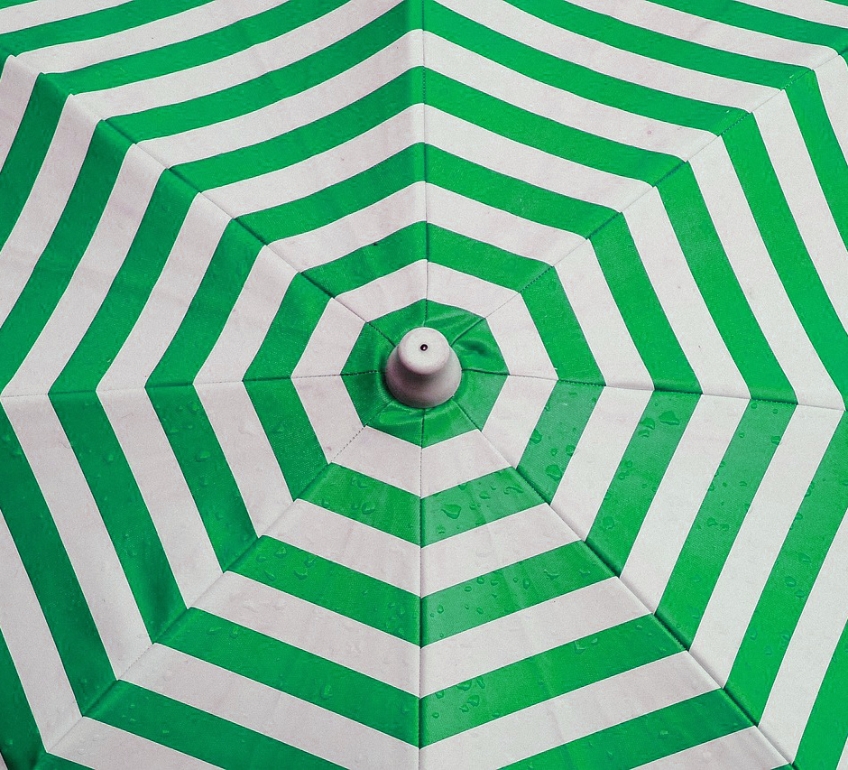 green and white striped umbrella