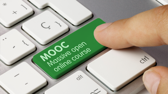 finger pushing computer key that has MOOC Massive open online course written on it