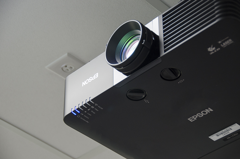 an epson projector mounted to the ceiling